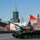 A World War II era Soviet tank T-34 rides during the Victory Day military parade marking 71 years after the victory in WWII in Red Square in Moscow, Russia, Monday, May 9, 2016. (AP Photo/Pavel Golovkin)